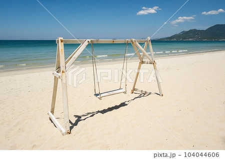 Swing on tropical beach. Summer vibe. 104044606