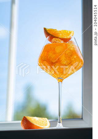 Glass of Aperol spritz cocktail Glass of Aperol spritz cocktail 104045514