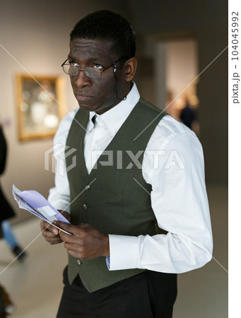 Afro man visiting exposition 104045992