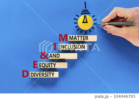 DEI Diversity equity inclusion matter symbol. Concept words DEI diversity equity and inclusion matter on wood block. Beautiful blue background. Business diversity equity inclusion matter concept DEI Diversity equity inclusion matter symbol. Concept words DEI diversity equity and inclusion matter on wood block. Beautiful blue background. Business diversity equity inclusion matter concept 104046705