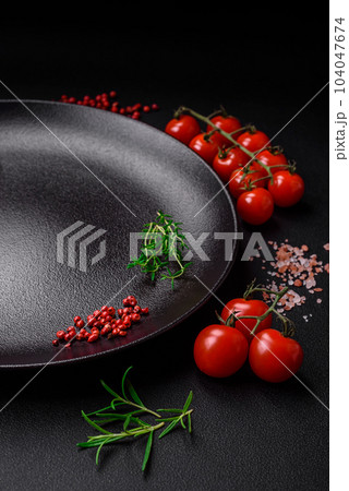 Ingredients for cooking cherry tomatoes, salt, spices and herbs 104047674