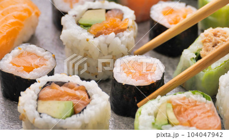 sushi background close-up. Maki sushi isolated for menu. sushi background close-up. Maki sushi isolated for menu. 104047942
