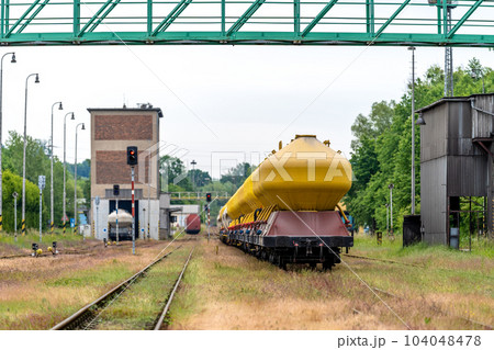 train transport and logistics, wagons with containers for the transport of cement train transport and logistics, wagons with containers for the transport of cement 104048478