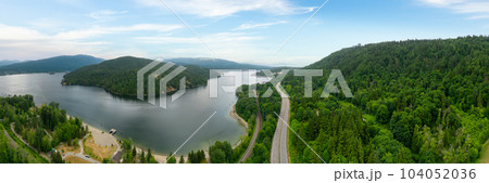 Aerial View of a Highway in City. Cloudy Sky. 104052036