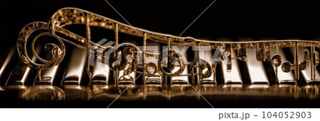 art background with the image of musical signs and symbols from metal 104052903