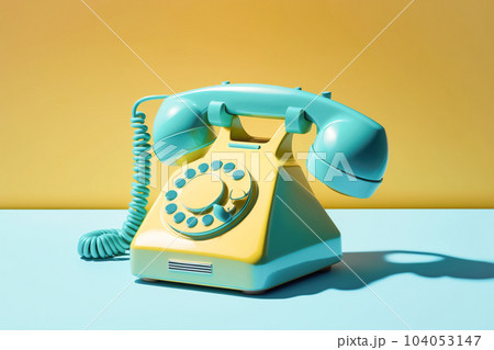 Vintage yellow lelephone with a tube on blue bright background. Retro items, 70s 80s culture nostalgia. Art concept Vintage yellow lelephone with a tube on blue bright background. Retro items, 70s 80s culture nostalgia. Art concept 104053147