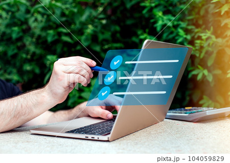 Signing electronic documents online, paperless office, signing business contract concept, 104059829
