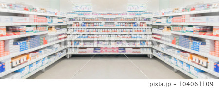 Pharmacy drugstore shelves interior blur medical background Pharmacy drugstore shelves interior blur medical background 104061109