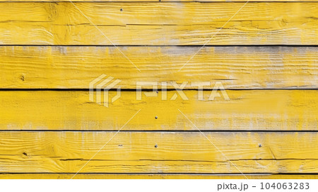 木の厚板、黄色のテクスチャー背景と背景写真、パステルイエロー板、イエロー板の壁 104063283