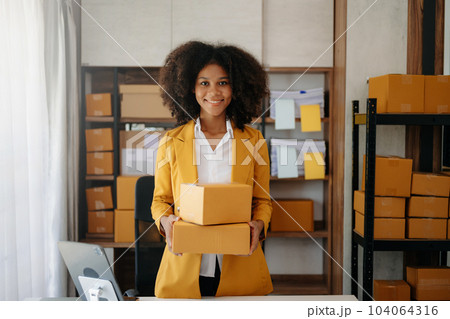 Small business entrepreneur SME freelance woman working at home office, BOX,tablet and laptop online, marketing, packaging, delivery,  e-commerce concept. 104064316