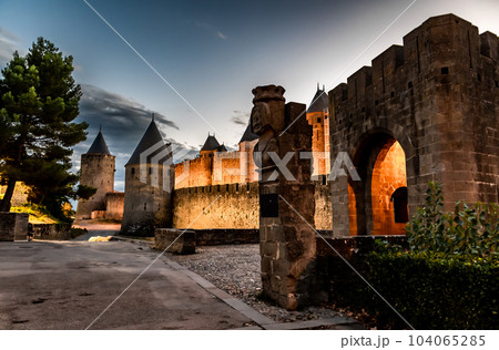 Spectacular Illuminated Ancient Fortress Of Medieval City Carcassonne In The Night In Occitania, France 104065285