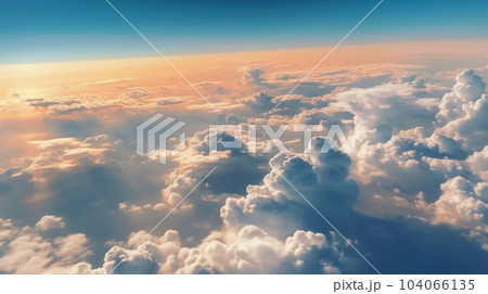 飛行機から見下ろす雲海 上空の雲の風景 上空の夕焼け 飛行機から見下ろす雲海 上空の雲の風景 上空の夕焼け 104066135