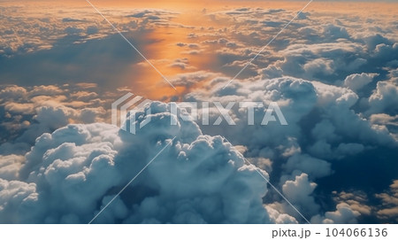 飛行機から見下ろす雲海 上空の雲の風景 上空の夕焼け 飛行機から見下ろす雲海 上空の雲の風景 上空の夕焼け 104066136