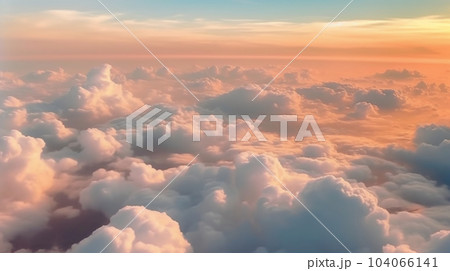 飛行機から見下ろす雲海 上空の雲の風景 上空の夕焼け 飛行機から見下ろす雲海 上空の雲の風景 上空の夕焼け 104066141