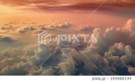 飛行機から見下ろす雲海 上空の雲の風景 上空の夕焼け 飛行機から見下ろす雲海 上空の雲の風景 上空の夕焼け 104066144