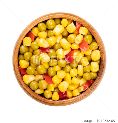 Mix of canned corn, green peas and diced red bell pepper, in a wooden bowl. Ready to eat Mexican maize mix, as a side dish to a barbecue. Isolated, from above, close-up, over white, macro food photo. Mix of canned corn, green peas and diced red bell pepper, in a wooden bowl. Ready to eat Mexican maize mix, as a side dish to a barbecue. Isolated, from above, close-up, over white, macro food photo. 104068465