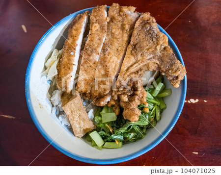 rice with deep fried pork ribs rice with deep fried pork ribs 104071025