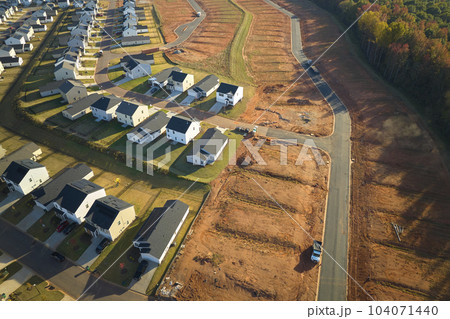 Ground prepared for building of new residential houses in South Carolina suburban development area. Concept of growing american suburbs 104071440
