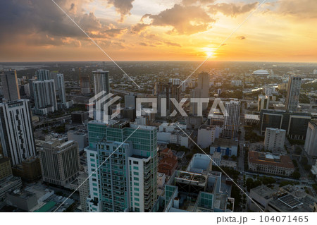 Evening urban landscape of downtown district of Miami Brickell in Florida, USA. Skyline with high skyscraper buildings in modern american megapolis Evening urban landscape of downtown district of Miami Brickell in Florida, USA. Skyline with high skyscraper buildings in modern american megapolis 104071465