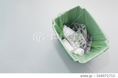 Mockup Trash Bin, Bucket Full Of Medication, Supplement. Pills, Tablet Bottles, Empty Capsule Pastilles. Medical Waste, Drug Consumption Concept. Pharmacy. Horizontal Plane Copy Space, Top View. Mockup Trash Bin, Bucket Full Of Medication, Supplement. Pills, Tablet Bottles, Empty Capsule Pastilles. Medical Waste, Drug Consumption Concept. Pharmacy. Horizontal Plane Copy Space, Top View. 104071712