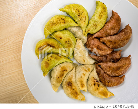 Deep-fried gyoza in a plate Deep-fried gyoza in a plate 104071949