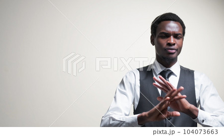 No deal. Offer refusal. Professional disagreement. Dissatisfied business man rejecting hands gesture isolated on white empty space background. No deal. Offer refusal. Professional disagreement. Dissatisfied business man rejecting hands gesture isolated on white empty space background. 104073663