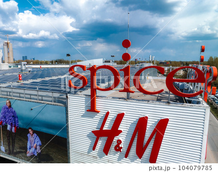 Aerial view of the Spice shopping mall in Riga, Latvia. Roof is covered with solar panels. 104079785