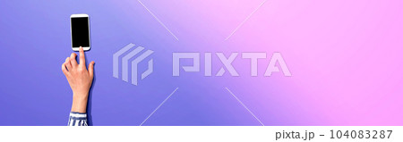 Person using a smartphone 104083287