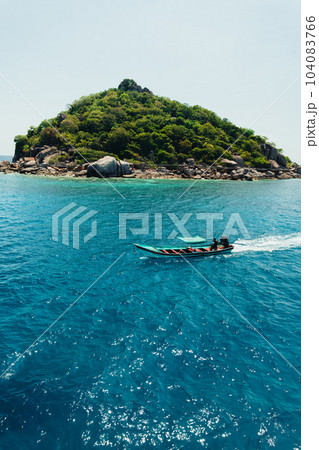 tropical island and long-tail boat tropical island and long-tail boat 104083766