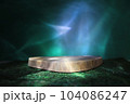 Sawn tree podium, on green moss, on a dark background. Beautiful northern lights on the background. Presentation of products. 104086247
