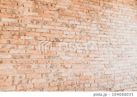 Old brick wall for background. Orange brick wall, under construction. Architecture textures 104088035