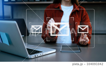 Woman hands using Laptop, tablet typing on keyboard and surfing the internet with email icon, email marketing concept, send e-mail or newsletter, online working internet network technology... Woman hands using Laptop, tablet typing on keyboard and surfing the internet with email icon, email marketing concept, send e-mail or newsletter, online working internet network technology... 104091042