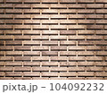 The brick wall has light from on top.Brown brick wall with copy space.  104092232