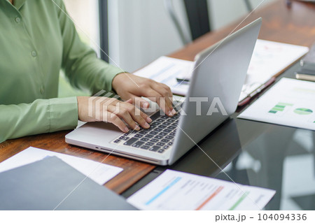 Business woman working in green eco friendly modern working space creative ideas for business eco friendly professional investor start up project business 104094336