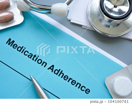 Pile of papers about Medication adherence on the desk. 104100781