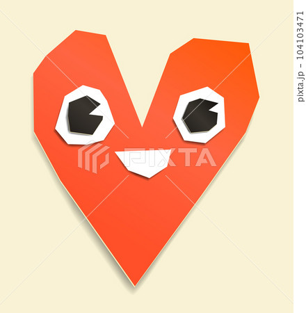 Heart cut out of paper with a face 104103471