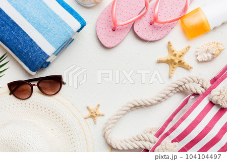 Summer vacation concept flat lay. beach accessories and towel top view. Space for text. travel concept 104104497