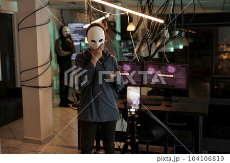 Cybercrime, thief recording video, asking money for ransom, anonymous threatening on smartphone camera, hacker stealing banking information. Online scam, criminal calling victim Cybercrime, thief recording video, asking money for ransom, anonymous threatening on smartphone camera, hacker stealing banking information. Online scam, criminal calling victim 104106819