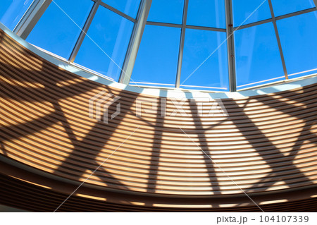 glass wooden dome, cupola, roof on sunny day. hall mall. close up glass wooden dome, cupola, roof on sunny day. hall mall. close up 104107339