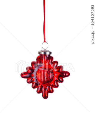 glass red rhombus star Christmas toy, decoration, red ribbon on white background with clipping path. glass toy for decoration of Christmas fir tree. close up glass red rhombus star Christmas toy, decoration, red ribbon on white background with clipping path. glass toy for decoration of Christmas fir tree. close up 104107693