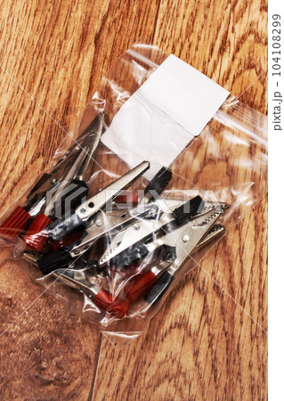 Engineering probes in package on wooden table Engineering probes in package on wooden table 104108299