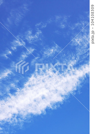 White cirrus clouds in the blue sky White cirrus clouds in the blue sky 104108309