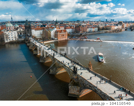 Scenic spring panoramic aerial view of the Old Town pier architecture and Charles Bridge over Vltava river in Prague, Czech Republic 104110540