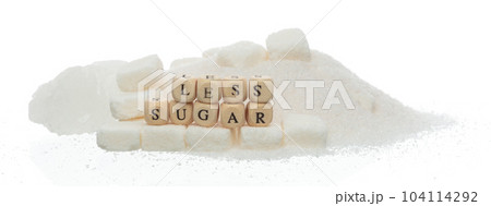 Less Sugar alphabet letter word bead on pile of refined sugar. Diabetes concept to reduce sweet food drink. Less Sugar letter word on sweetener type. White background isolated 104114292