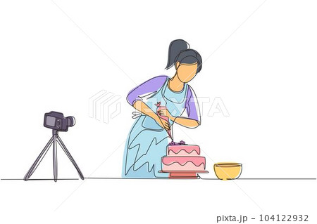 Single continuous line drawing girl baking and decorating cake at kitchen. Woman blogger recording video on camera, using tripod, posting it on social media. One line draw design vector illustration 104122932