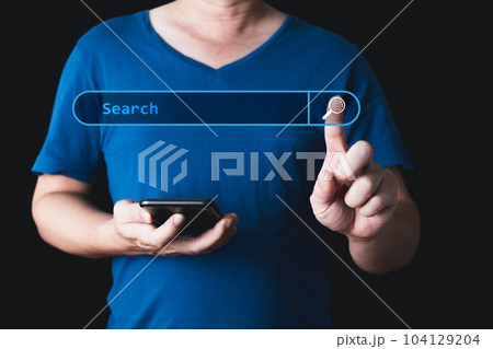 Searching Browsing Internet Data Information with blank search bar. hand of businessman working with smartphone . SearchEngine Optimization SEO Networking Concept. 104129204