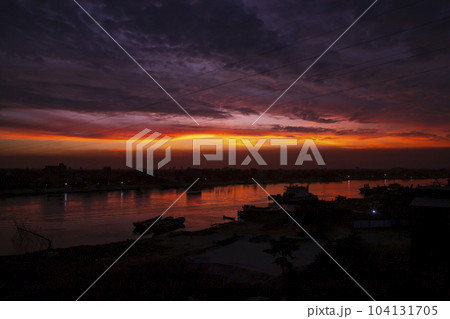 Sunset on the Shitalakshya River in Bangladesh 104131705