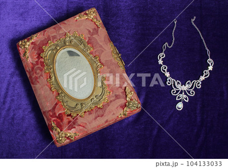 Crystal Rhinestone Jewelry on Antique Book With Mirror Crystal Rhinestone Jewelry on Antique Book With Mirror 104133033