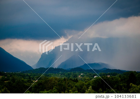 Dark clouds and rain over mountains in Dolomites, Italy Dark clouds and rain over mountains in Dolomites, Italy 104133681