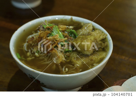 Top view of a bowl of soto seger or beef soup from Boyolali, Indonesia. 104140701